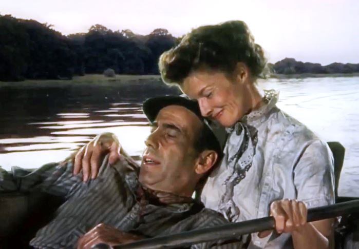 Still from 'African Queen' showing a glowing Bogart and Hepburn