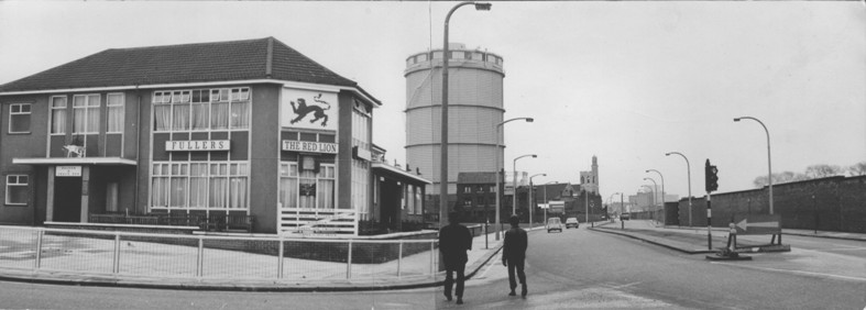 B/W photo showing a modern (for 1970) pub at an open road junction