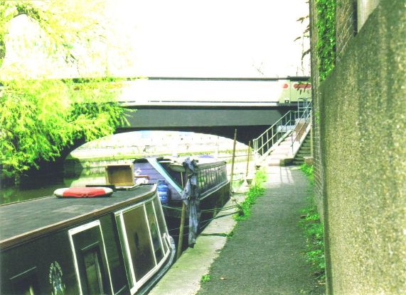 Two barges near bridge