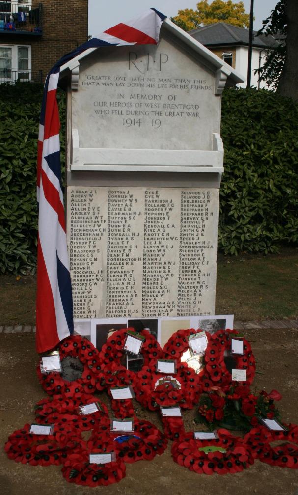 Memorial following unveiling, with poppy wreaths