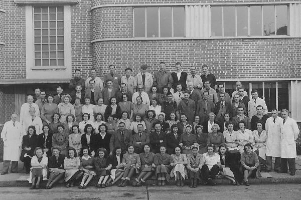 Workforce photo taken outside the front of the building shown in the first photo