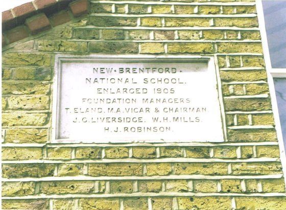 Plaque set in wall