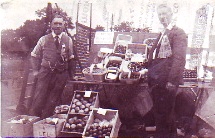 Sepia photo of fruit stall and T W Stockley, Brentford Market, 1937