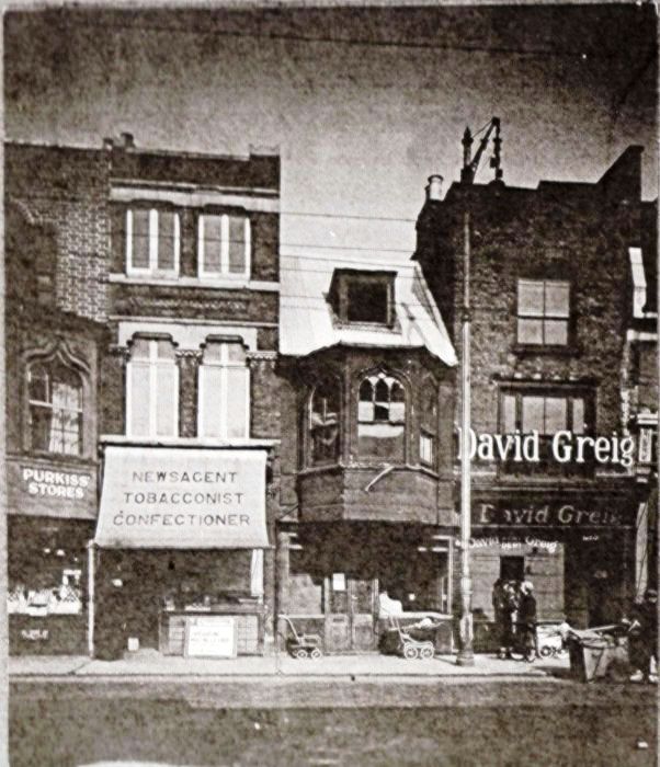 view of four High Street shops, three having three storeys, one just two