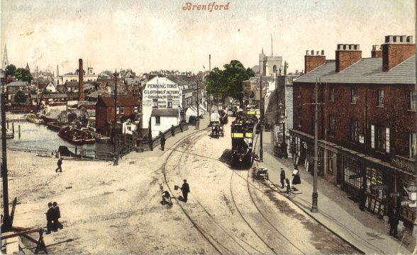 Tinted view of busy street with wharves in background