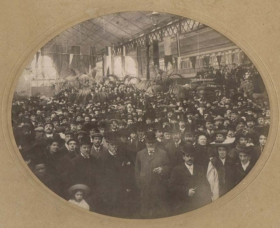 Market hall interior with several hundred people
