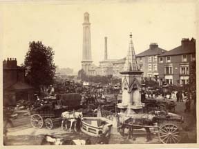 Market carts parked round the fountain at Kew Bridge (either 1892 or early 1893); image provided by Chiswick Public Library
