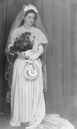 Portrait of Ena in her wedding dress